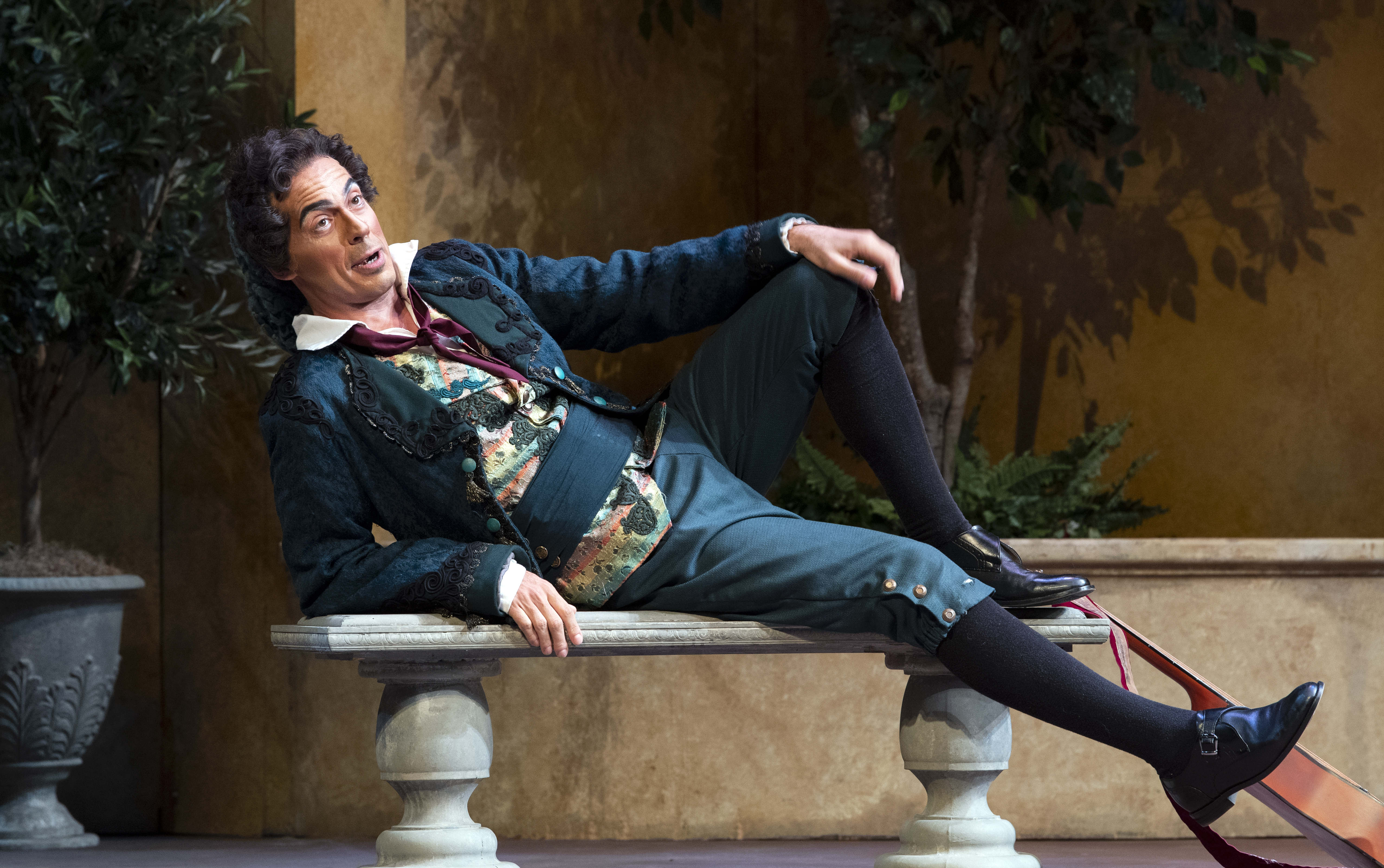 The Barber of Seville - Figaro leaning on a bench